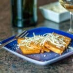 A photo of panelle on a blue plate.